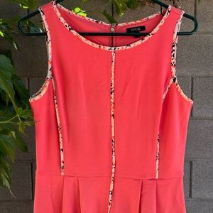 Coral fitted dress.